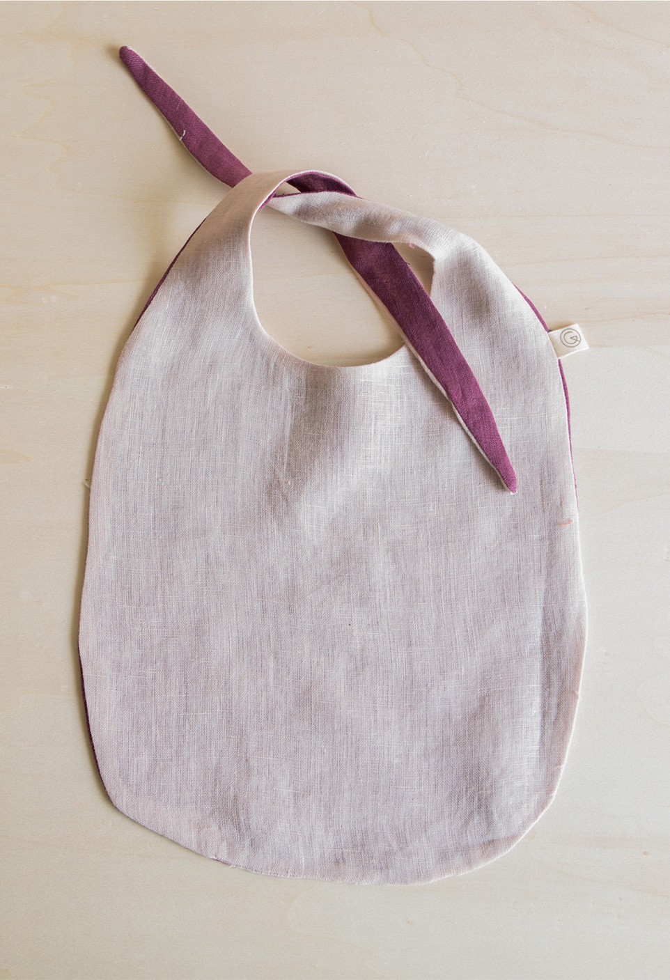 double sided bib pink dragée and violet vigne