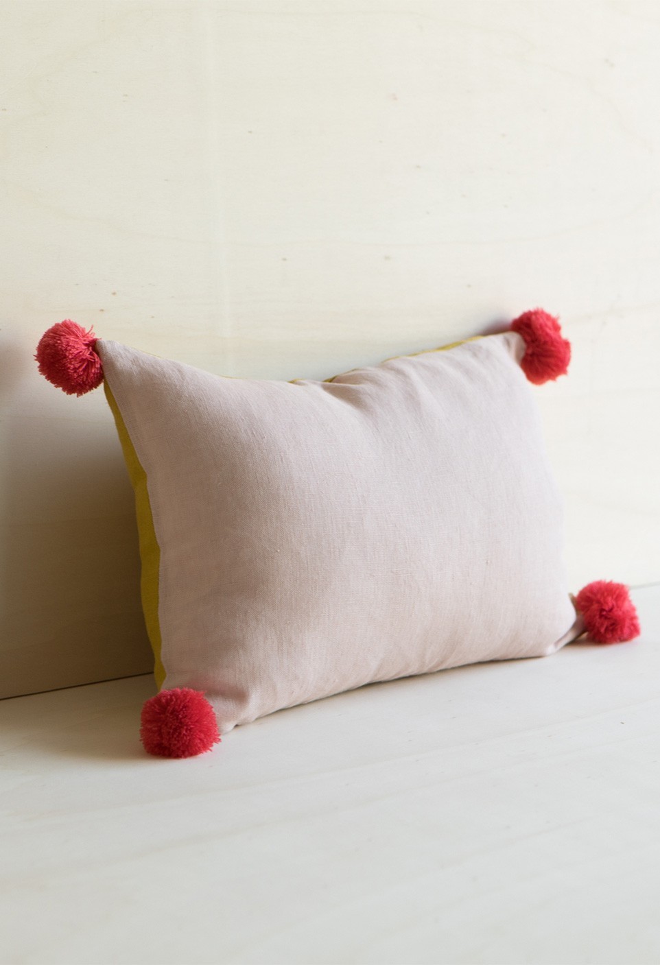 washed lined cushion pink dragée cream milk with pompons